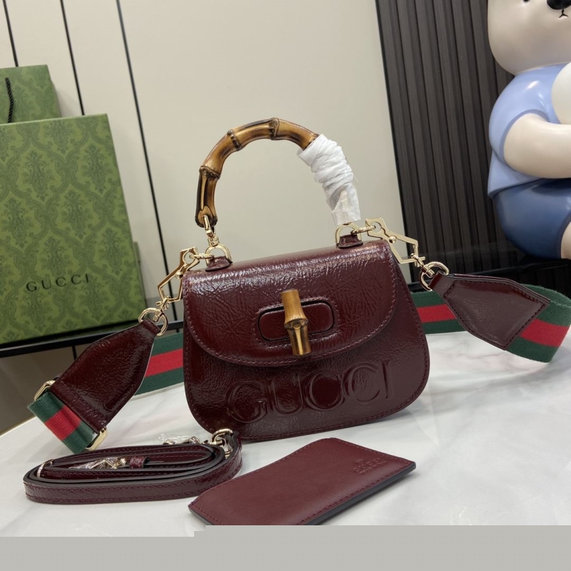 G*u*i top handle bags